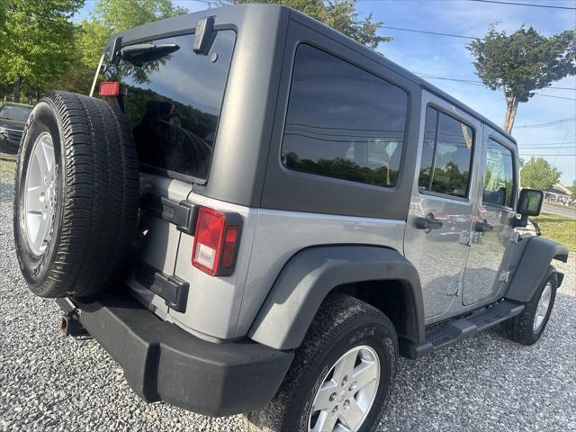 used 2014 Jeep Wrangler Unlimited car, priced at $9,999