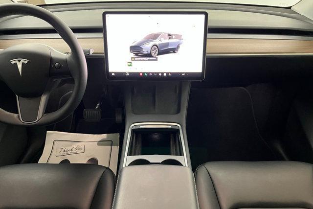 used 2025 Tesla Model Y car, priced at $39,496
