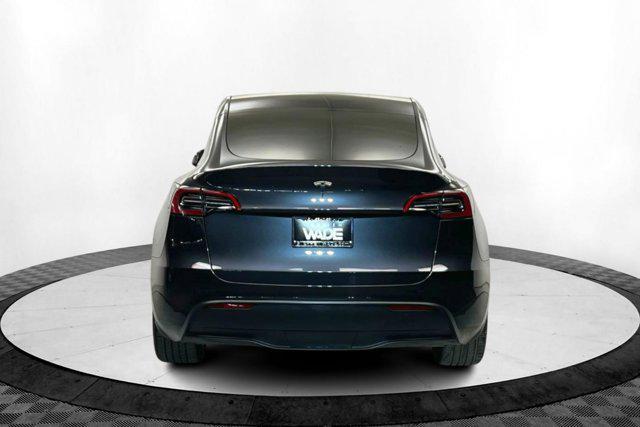 used 2025 Tesla Model Y car, priced at $39,496