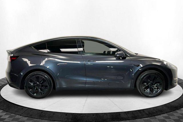 used 2025 Tesla Model Y car, priced at $39,496
