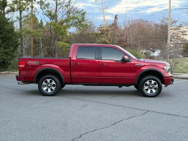 used 2014 Ford F-150 car, priced at $13,999