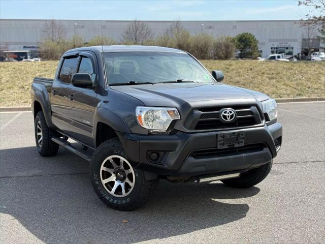 used 2014 Toyota Tacoma car, priced at $13,499