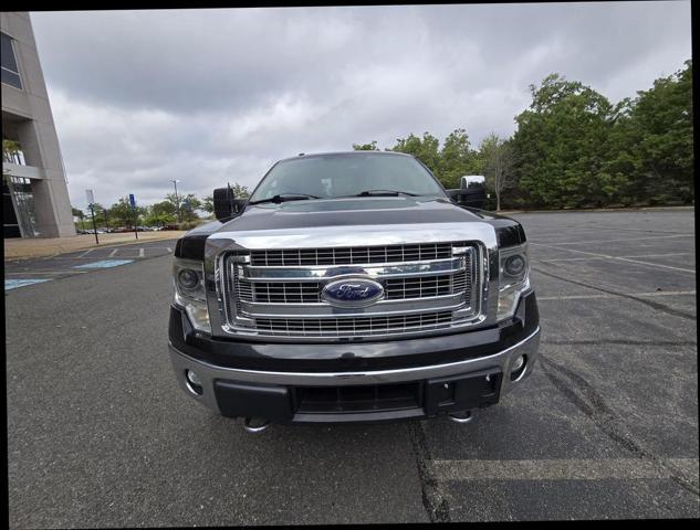 used 2014 Ford F-150 car, priced at $14,999