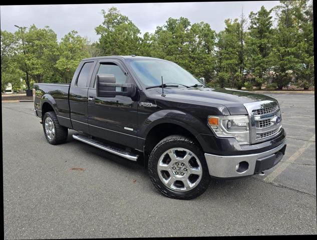 used 2014 Ford F-150 car, priced at $14,999