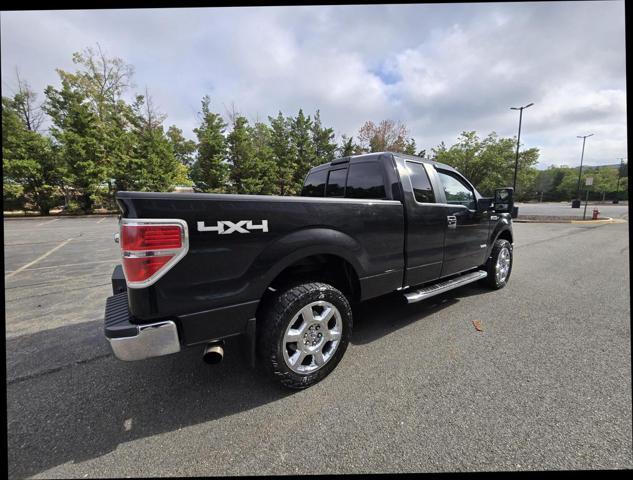 used 2014 Ford F-150 car, priced at $14,999