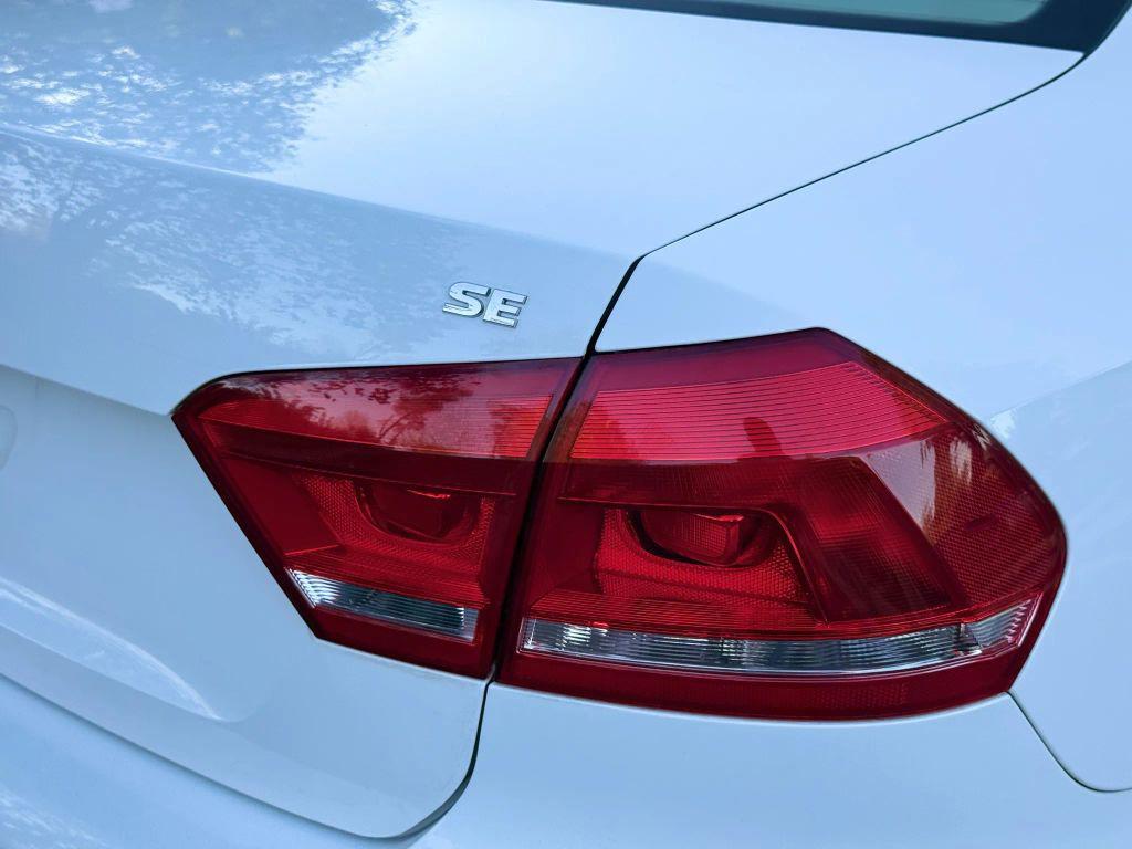 used 2012 Volkswagen Passat car, priced at $5,399