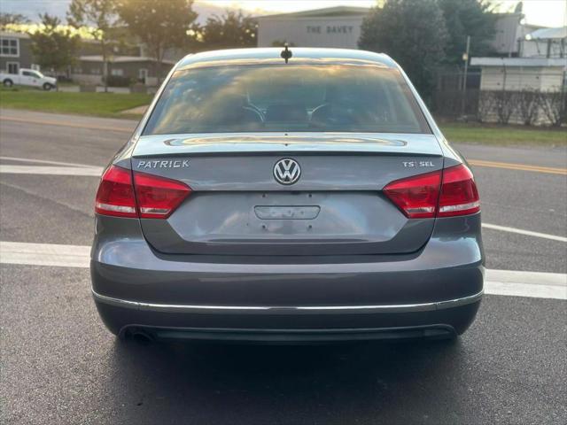 used 2014 Volkswagen Passat car, priced at $5,999