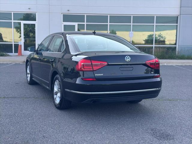 used 2016 Volkswagen Passat car, priced at $7,777