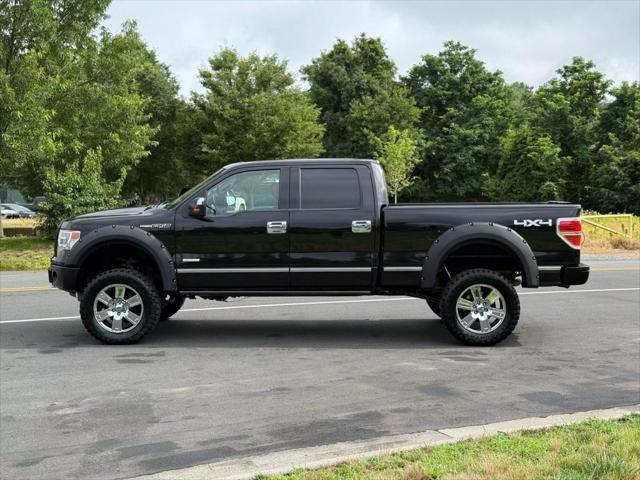 used 2014 Ford F-150 car, priced at $14,999