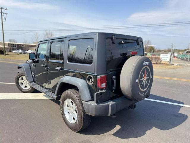 used 2012 Jeep Wrangler Unlimited car, priced at $13,499