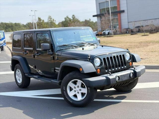 used 2012 Jeep Wrangler Unlimited car, priced at $13,499