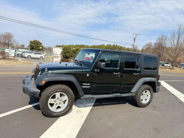 used 2012 Jeep Wrangler Unlimited car, priced at $13,499