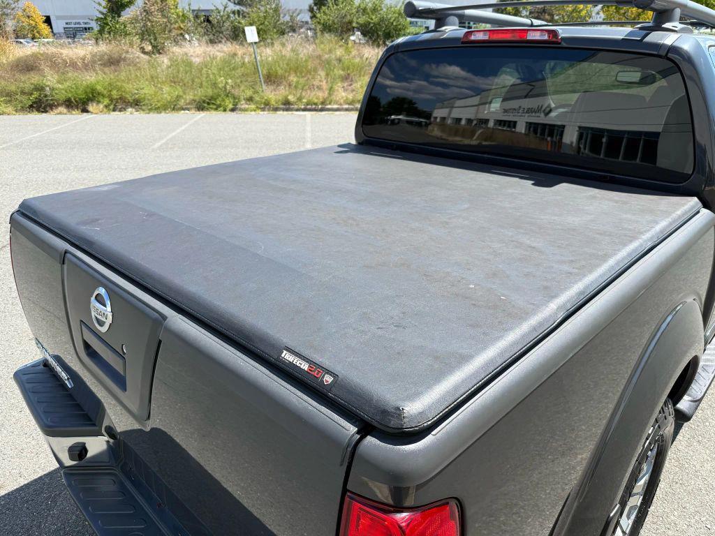 used 2010 Nissan Frontier car, priced at $10,999