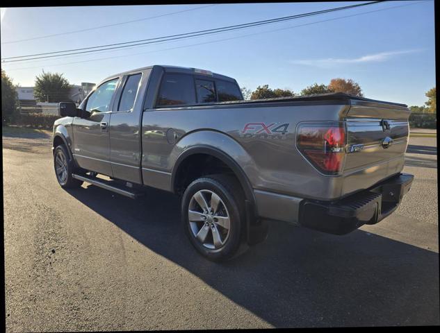 used 2014 Ford F-150 car, priced at $12,999