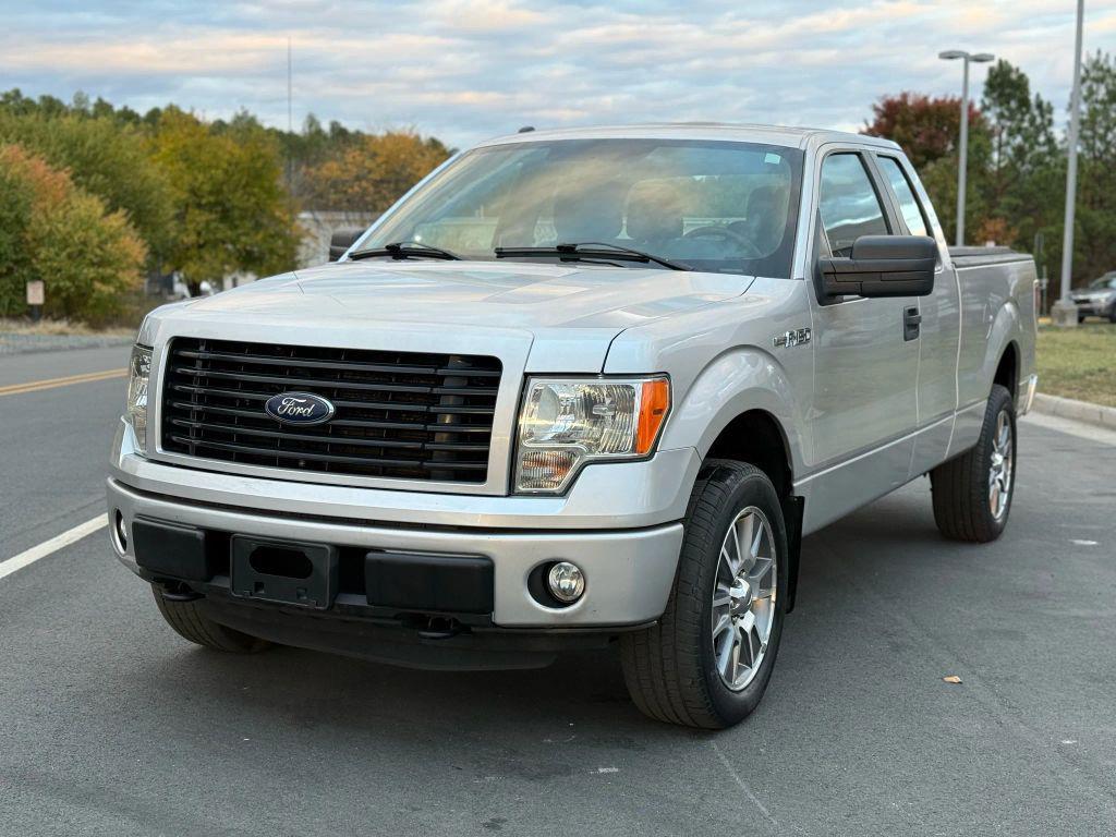 used 2014 Ford F-150 car, priced at $11,999