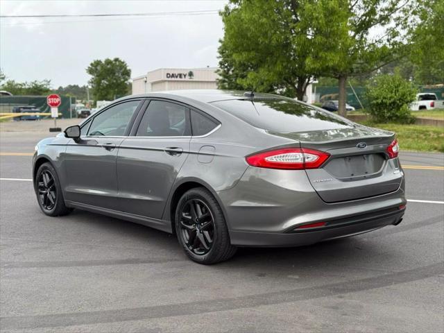 used 2014 Ford Fusion car, priced at $7,999