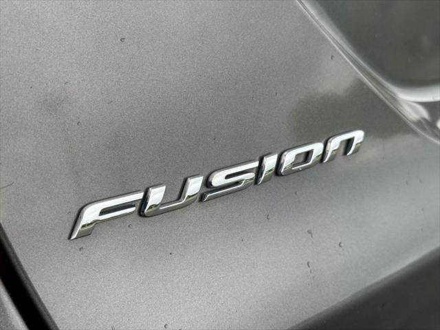 used 2014 Ford Fusion car, priced at $7,999