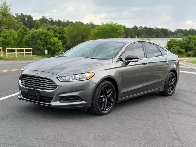 used 2014 Ford Fusion car, priced at $7,999