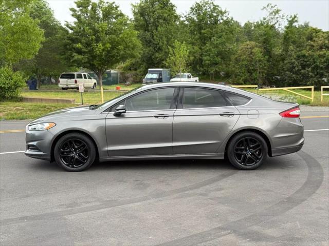 used 2014 Ford Fusion car, priced at $7,999