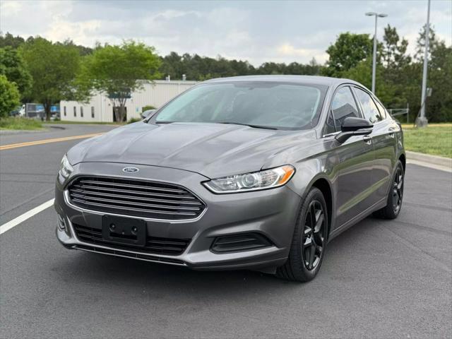 used 2014 Ford Fusion car, priced at $7,999