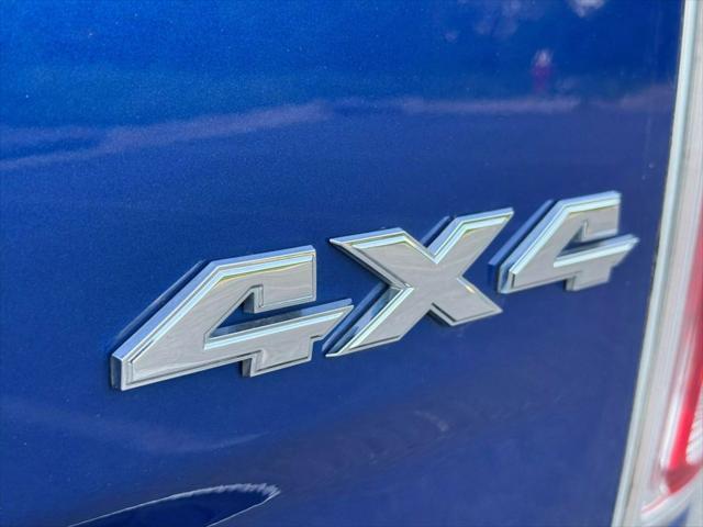 used 2014 Ram 1500 car, priced at $16,999