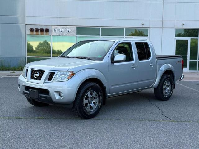 used 2010 Nissan Frontier car, priced at $11,499