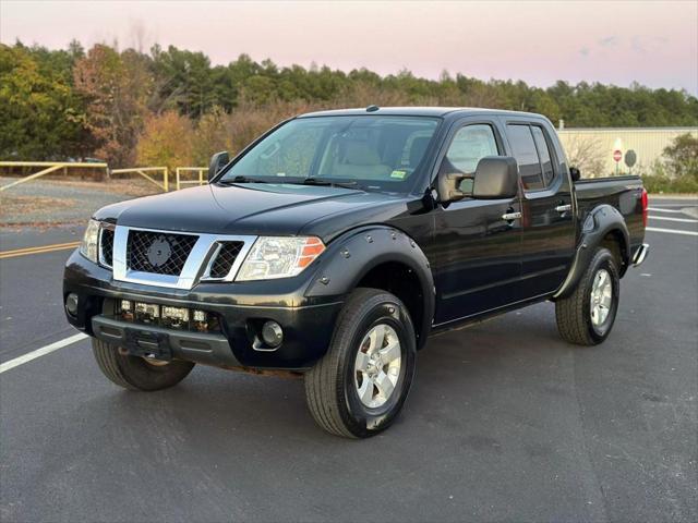 used 2013 Nissan Frontier car, priced at $10,999