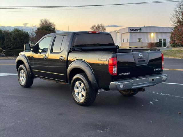 used 2013 Nissan Frontier car, priced at $10,999