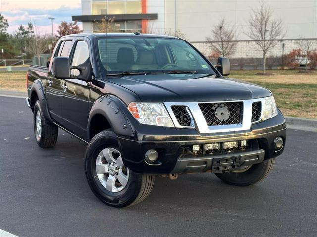 used 2013 Nissan Frontier car, priced at $10,999