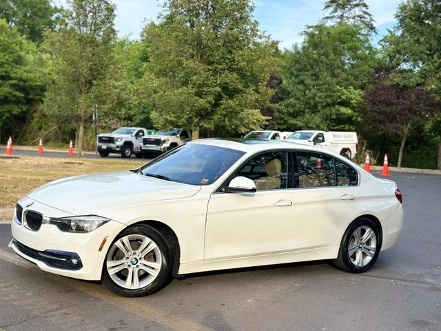 used 2017 BMW 330 car, priced at $13,999