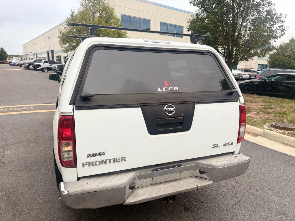 used 2011 Nissan Frontier car, priced at $8,999