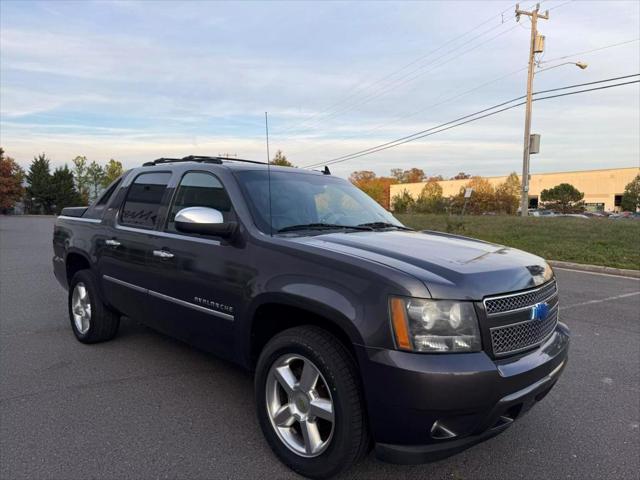 used 2011 Chevrolet Avalanche car, priced at $11,477