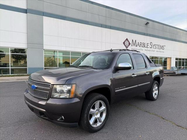 used 2011 Chevrolet Avalanche car, priced at $11,477