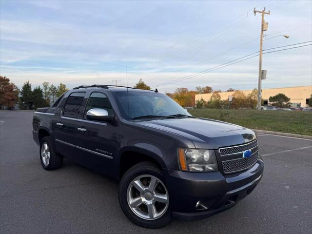 used 2011 Chevrolet Avalanche car, priced at $11,477