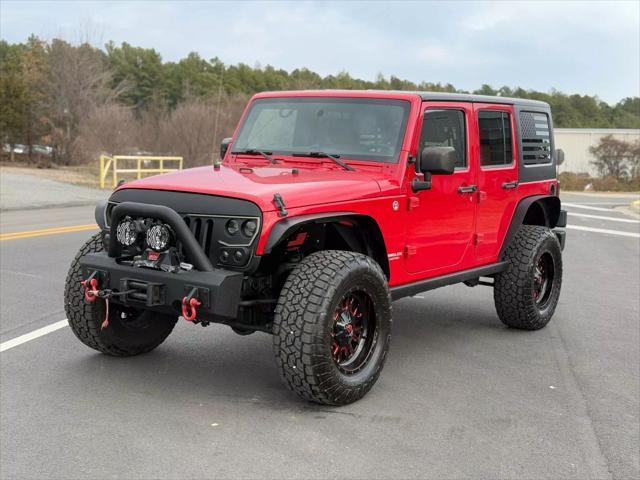 used 2012 Jeep Wrangler Unlimited car, priced at $16,499