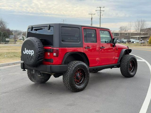 used 2012 Jeep Wrangler Unlimited car, priced at $16,499