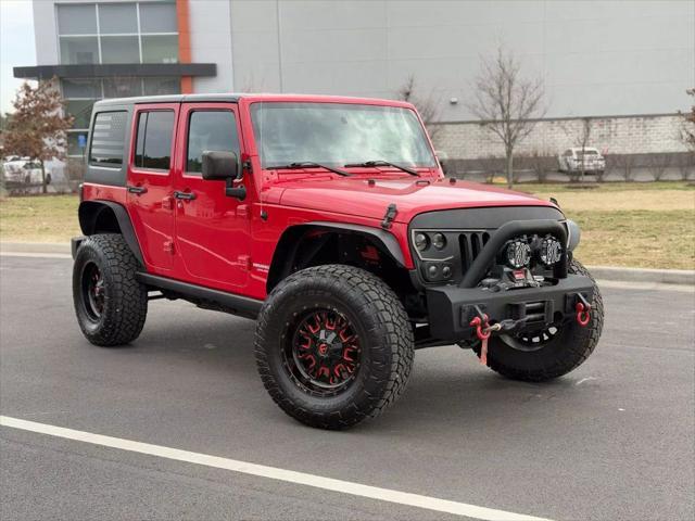 used 2012 Jeep Wrangler Unlimited car, priced at $16,499