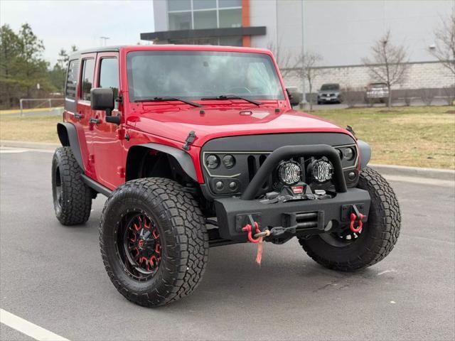 used 2012 Jeep Wrangler Unlimited car, priced at $16,499