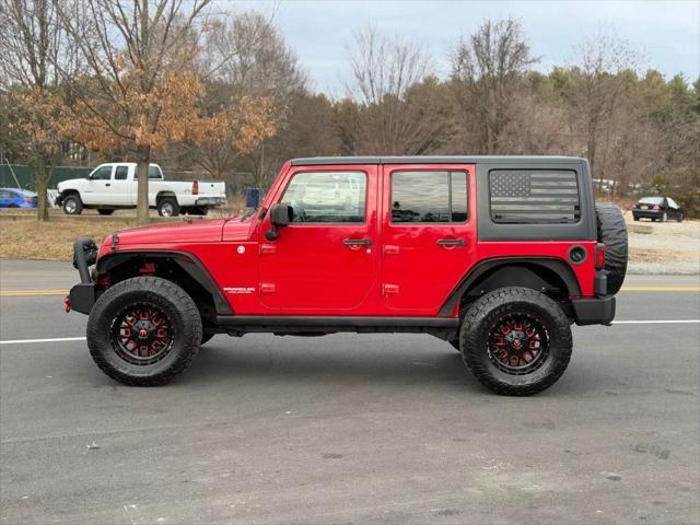 used 2012 Jeep Wrangler Unlimited car, priced at $16,499