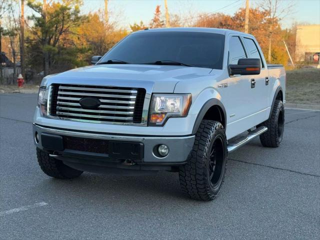 used 2011 Ford F-150 car, priced at $9,999