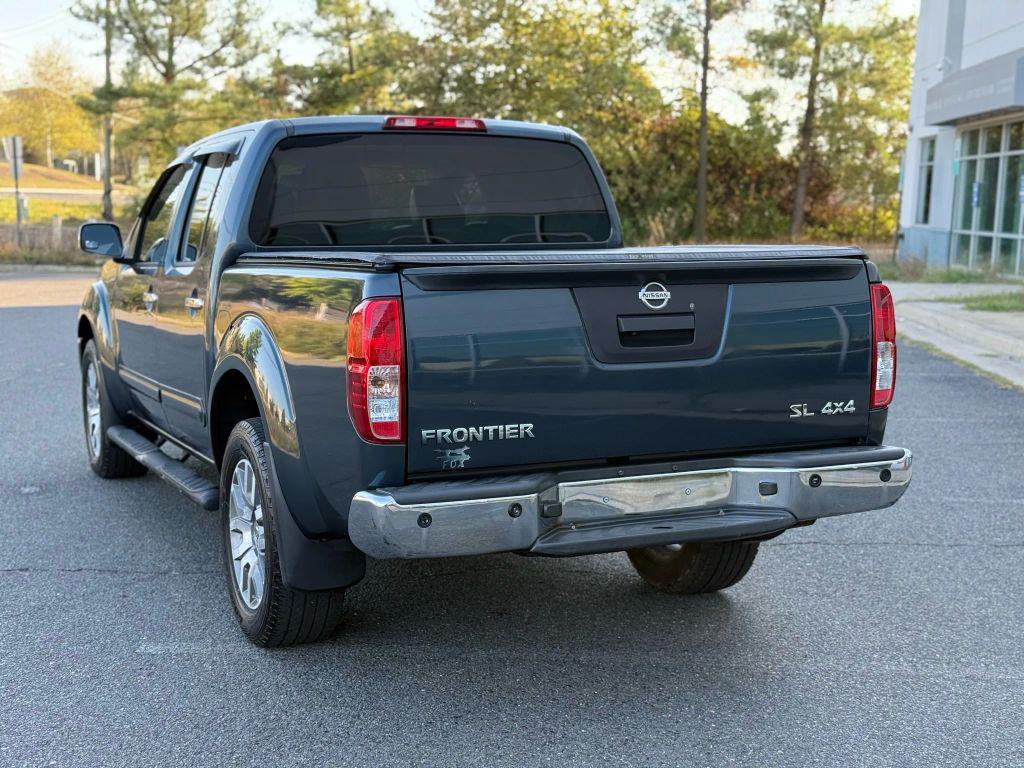 used 2013 Nissan Frontier car, priced at $13,499