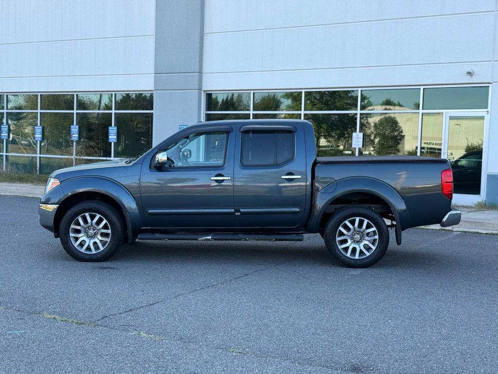 used 2013 Nissan Frontier car, priced at $13,499