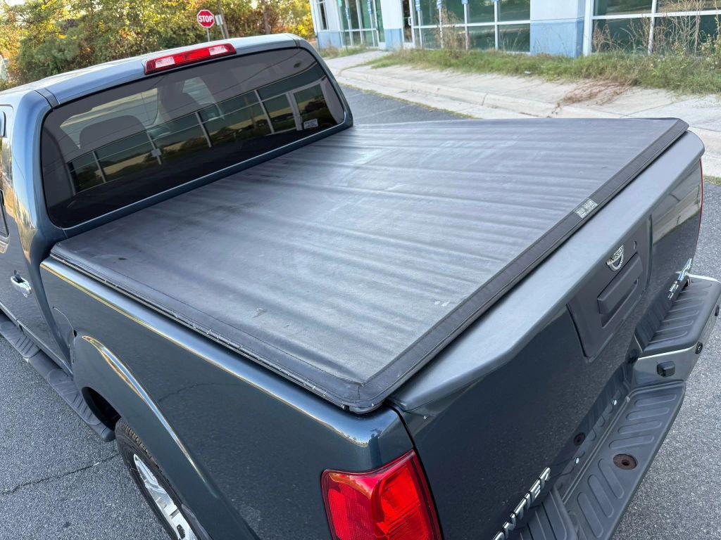 used 2013 Nissan Frontier car, priced at $13,499