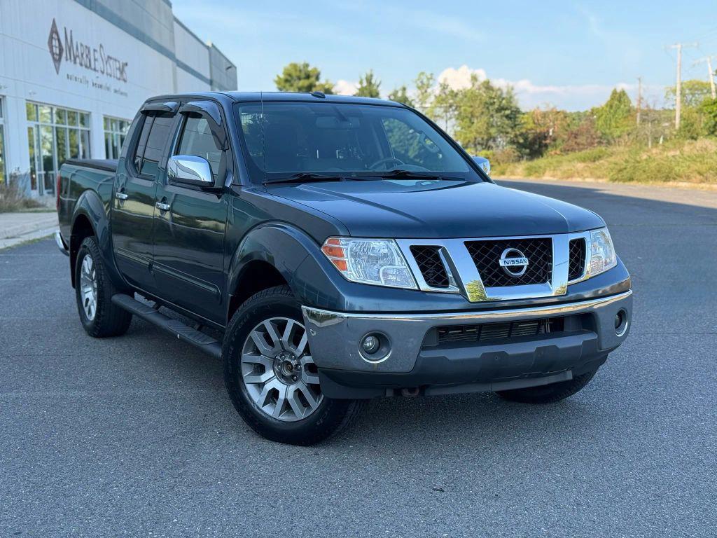 used 2013 Nissan Frontier car, priced at $13,499