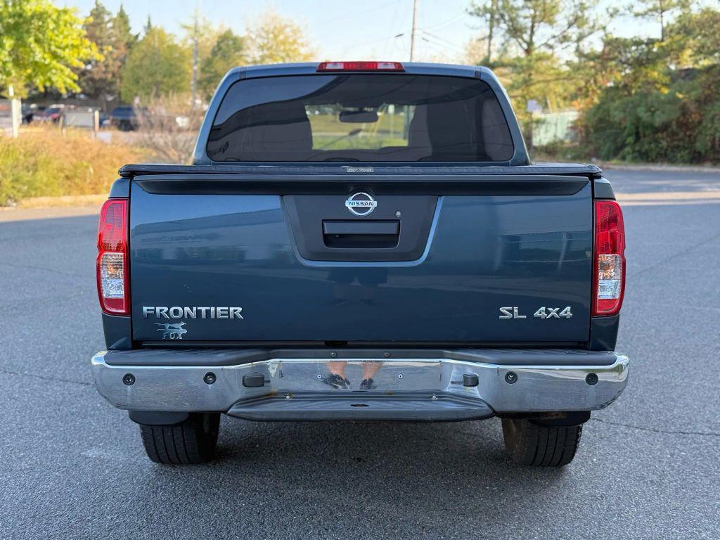 used 2013 Nissan Frontier car, priced at $13,499