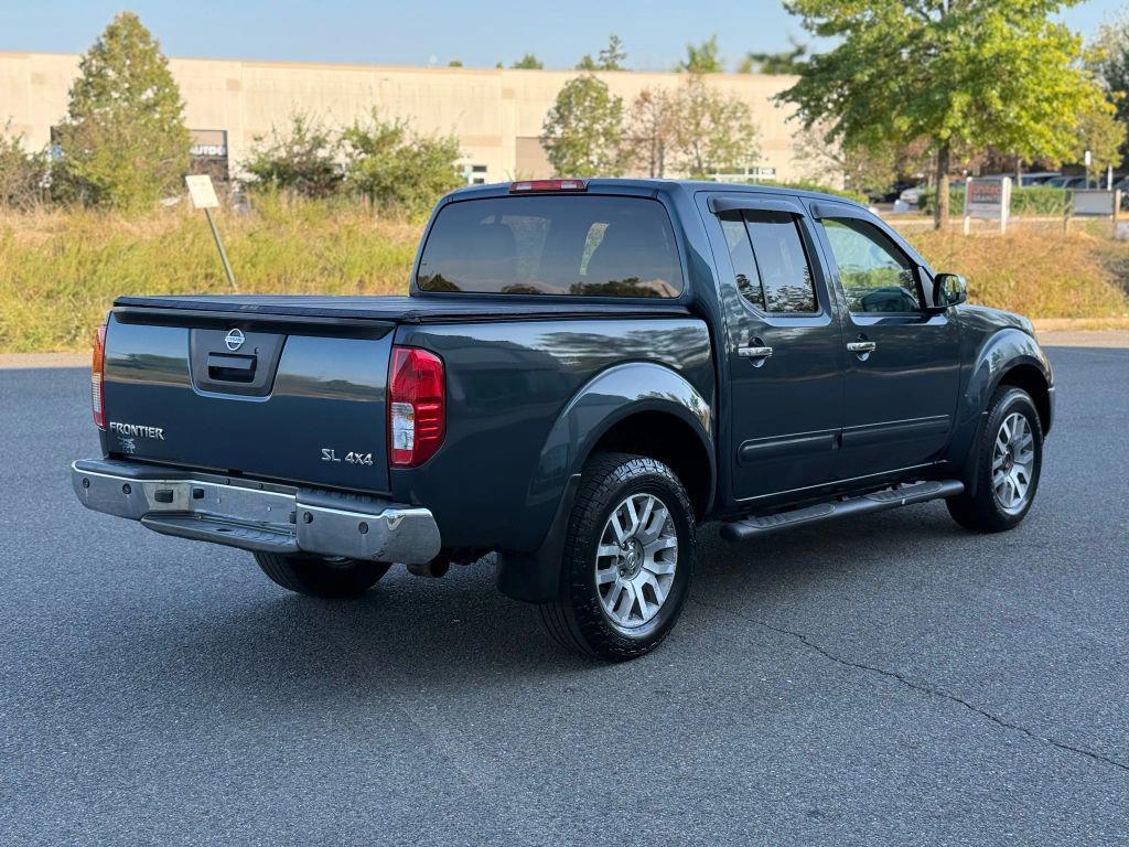 used 2013 Nissan Frontier car, priced at $13,499