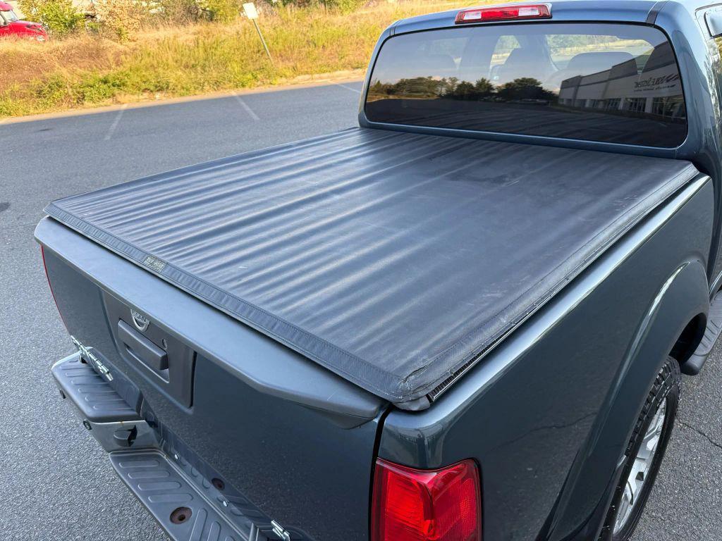 used 2013 Nissan Frontier car, priced at $13,499