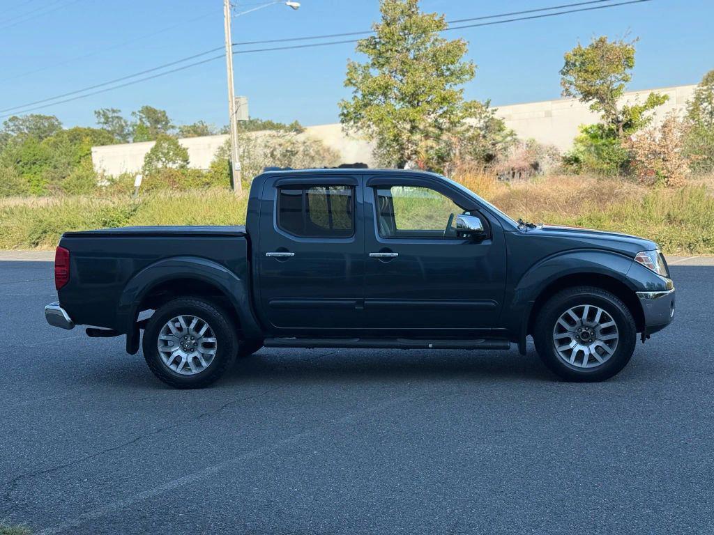 used 2013 Nissan Frontier car, priced at $13,499