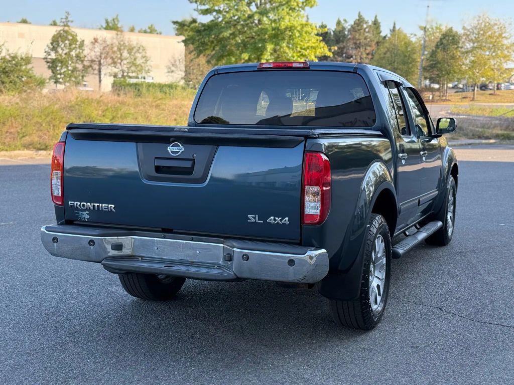 used 2013 Nissan Frontier car, priced at $13,499