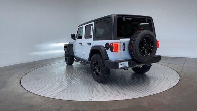used 2021 Jeep Wrangler Unlimited car, priced at $26,674